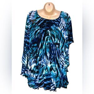 CATO Women Plus Overlay Sleeveless V-Neckl ruffled and straight hemline hips.